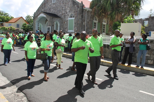 Acting Premier of Nevis Hon. Mark Brantley (middle front) leads colleague Ministers and other members of the Nevis Island Administration Cabinet at the 30th Child Month Parade in Charlestown on June 06, 2014